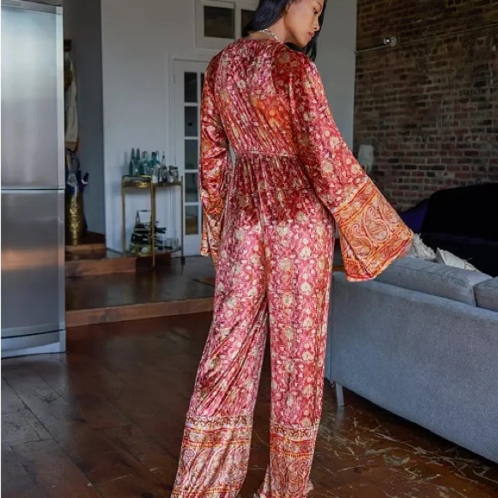 Free People Harper printed one piece Sangria jumpsuit/ jumper velvet